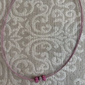 Pink wire necklace with 3 crystal beads